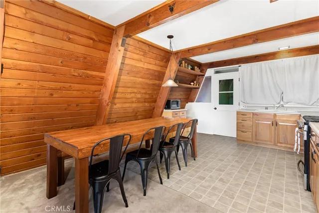 a dinning table and chairs in a patio