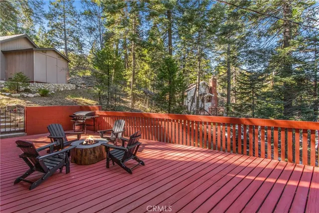 a view of a chairs on the roof deck