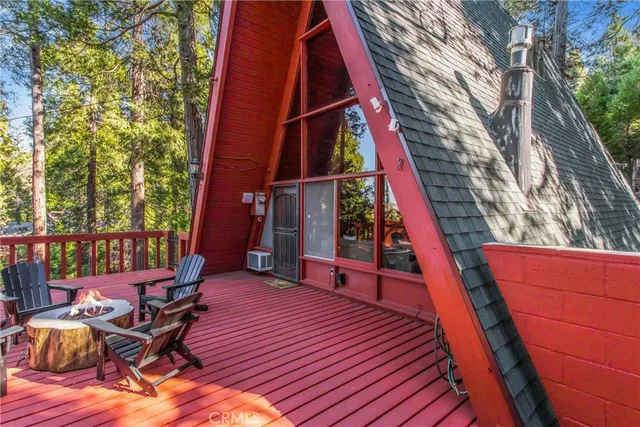 a view of a forest from a balcony