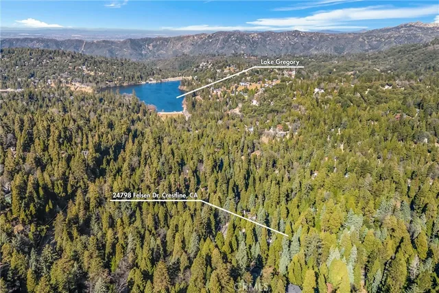 a backyard of a house with lots of trees