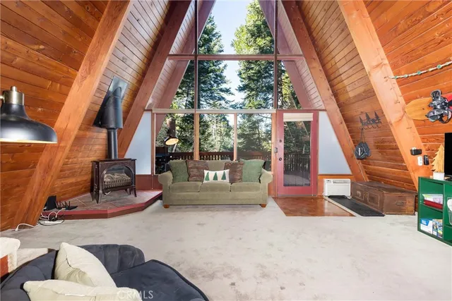 a backyard of a house with outdoor seating