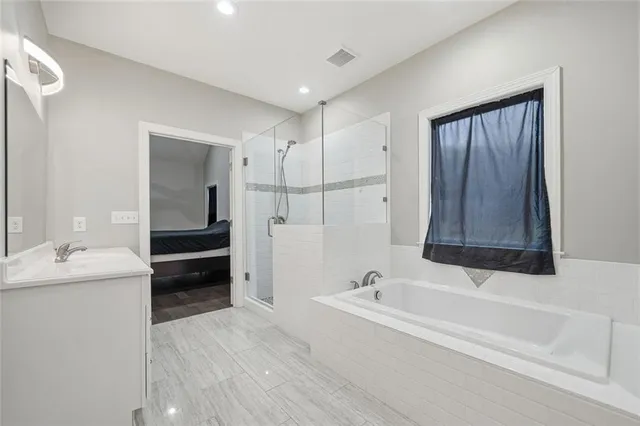 a bathroom with a sink and a bathtub