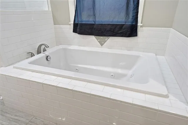 a bathroom with a bathtub