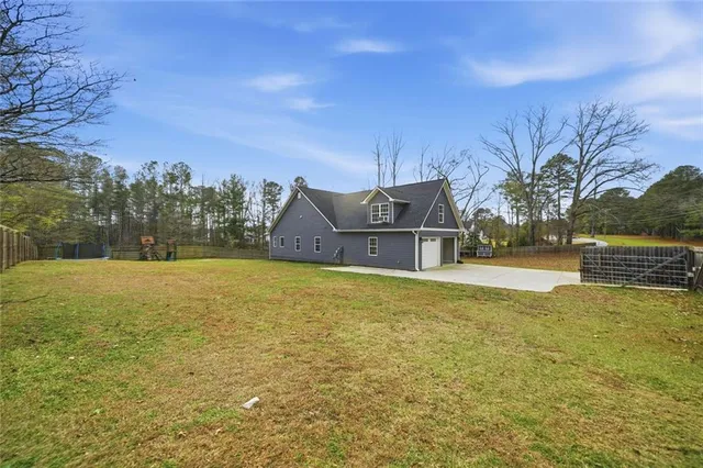 a view of house with outdoor space