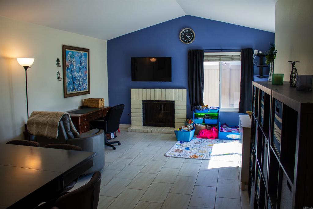 10385 Seth Way Santee, CA 92071 - Photo 15 of 33 a living room with furniture and a fireplace