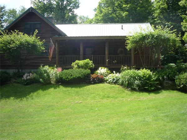 300 High St Hill Road Windsor, MA 01270 - Photo 3 of 30 a view of a garden with plants