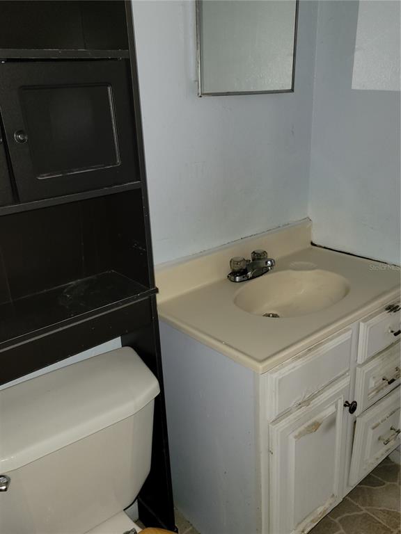 653 Atlas Avenue Northeast Palm Bay, FL 32905 - Photo 13 of 24 a utility room with dryer and washer
