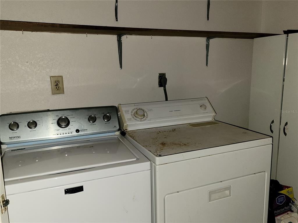 653 Atlas Avenue Northeast Palm Bay, FL 32905 - Photo 17 of 24 a close up view of washer and dryer