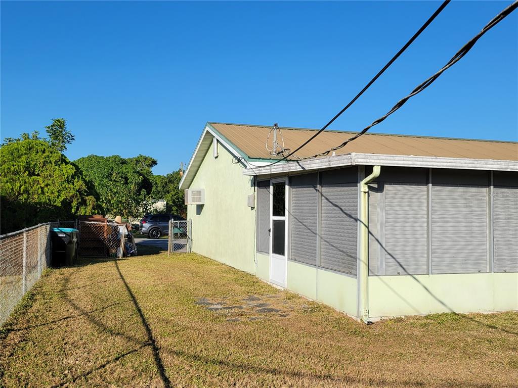 653 Atlas Avenue Northeast Palm Bay, FL 32905 - Photo 8 of 24 a house view with a backyard space