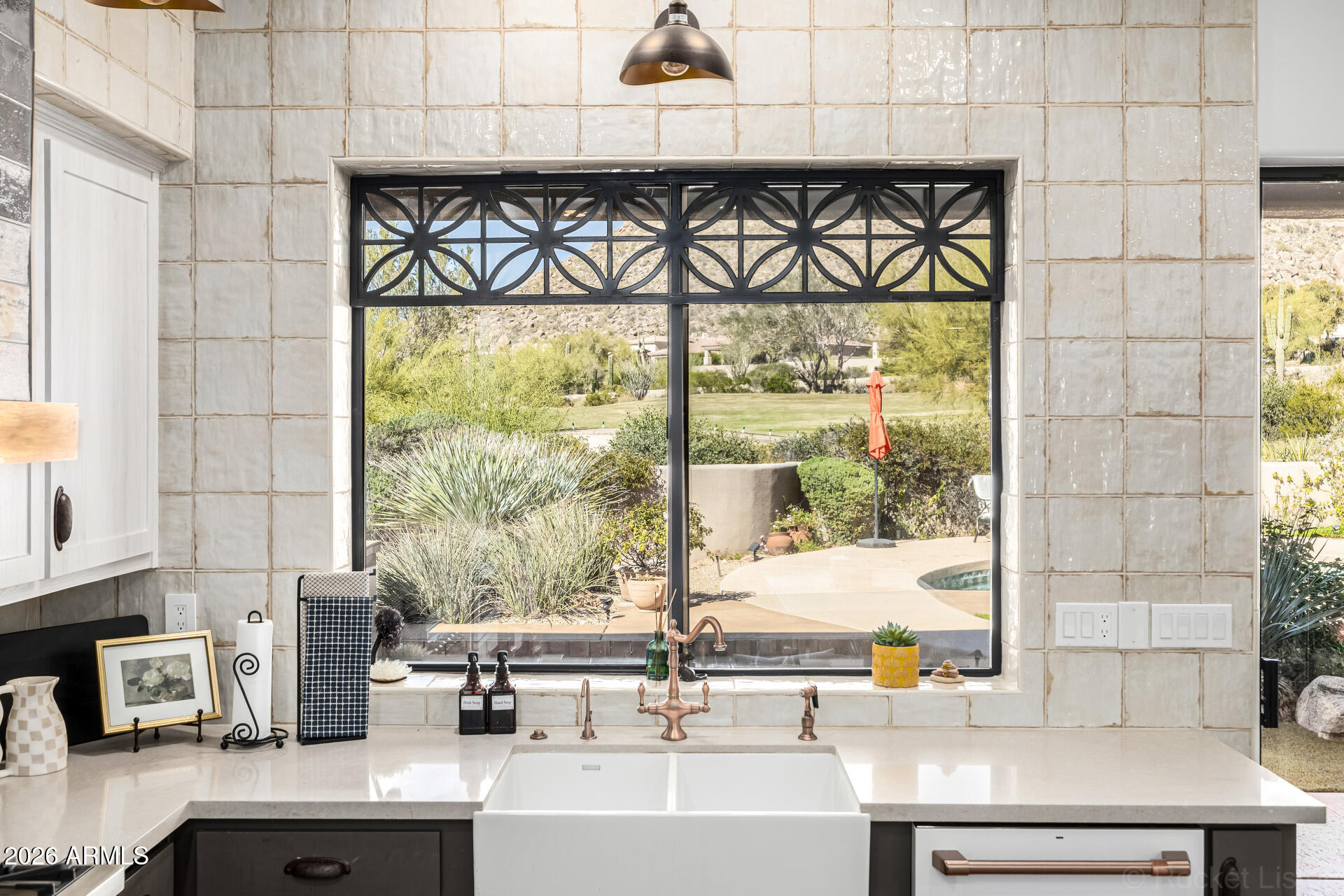 10801 East Happy Valley Road, Unit 24 Scottsdale, AZ 85255 - Photo 13 of 35 a kitchen with a sink and large window