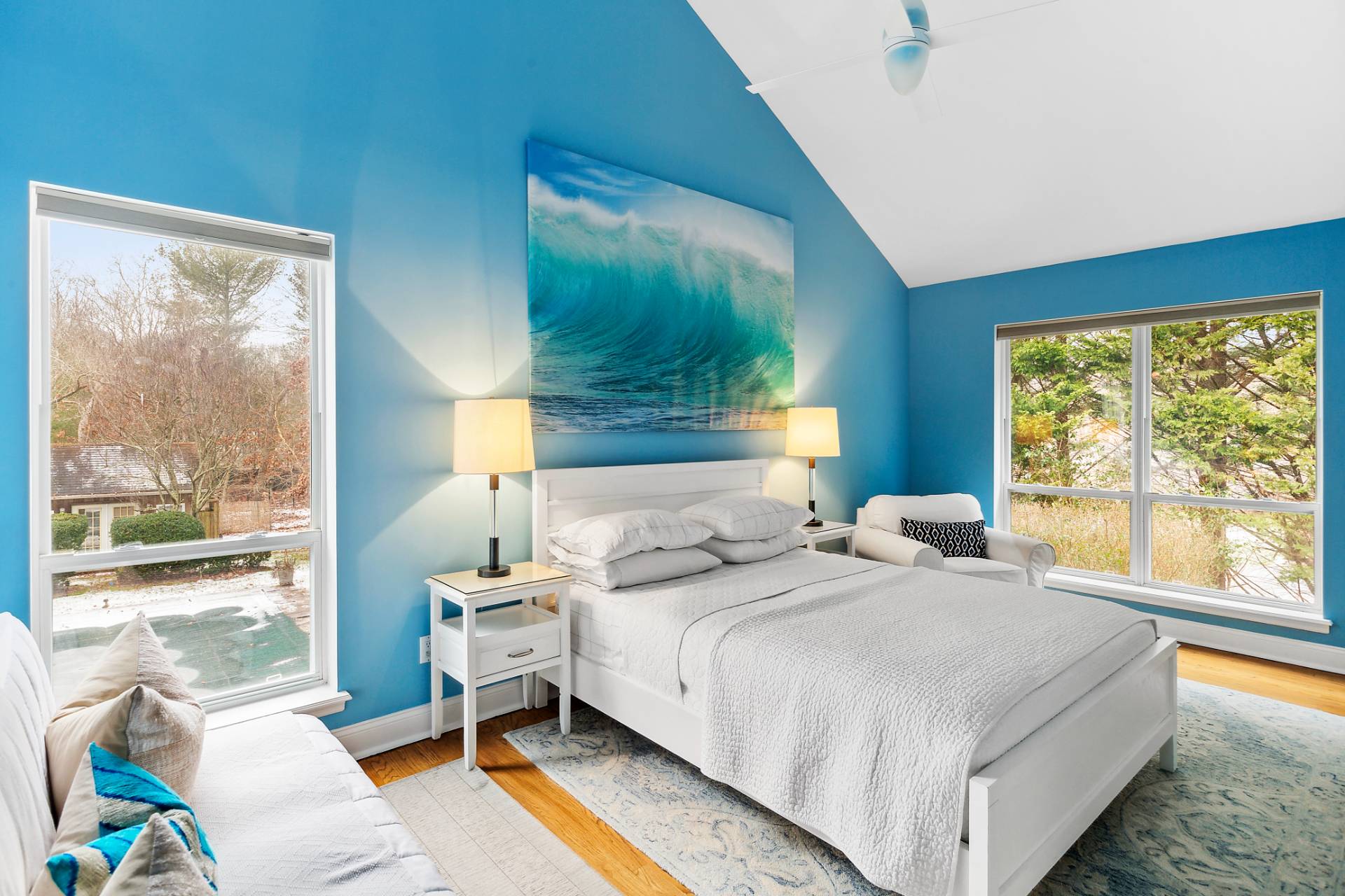 15 East Gate Road Wainscott, NY 11975 - Photo 8 of 9 a bedroom with a bed and glass window