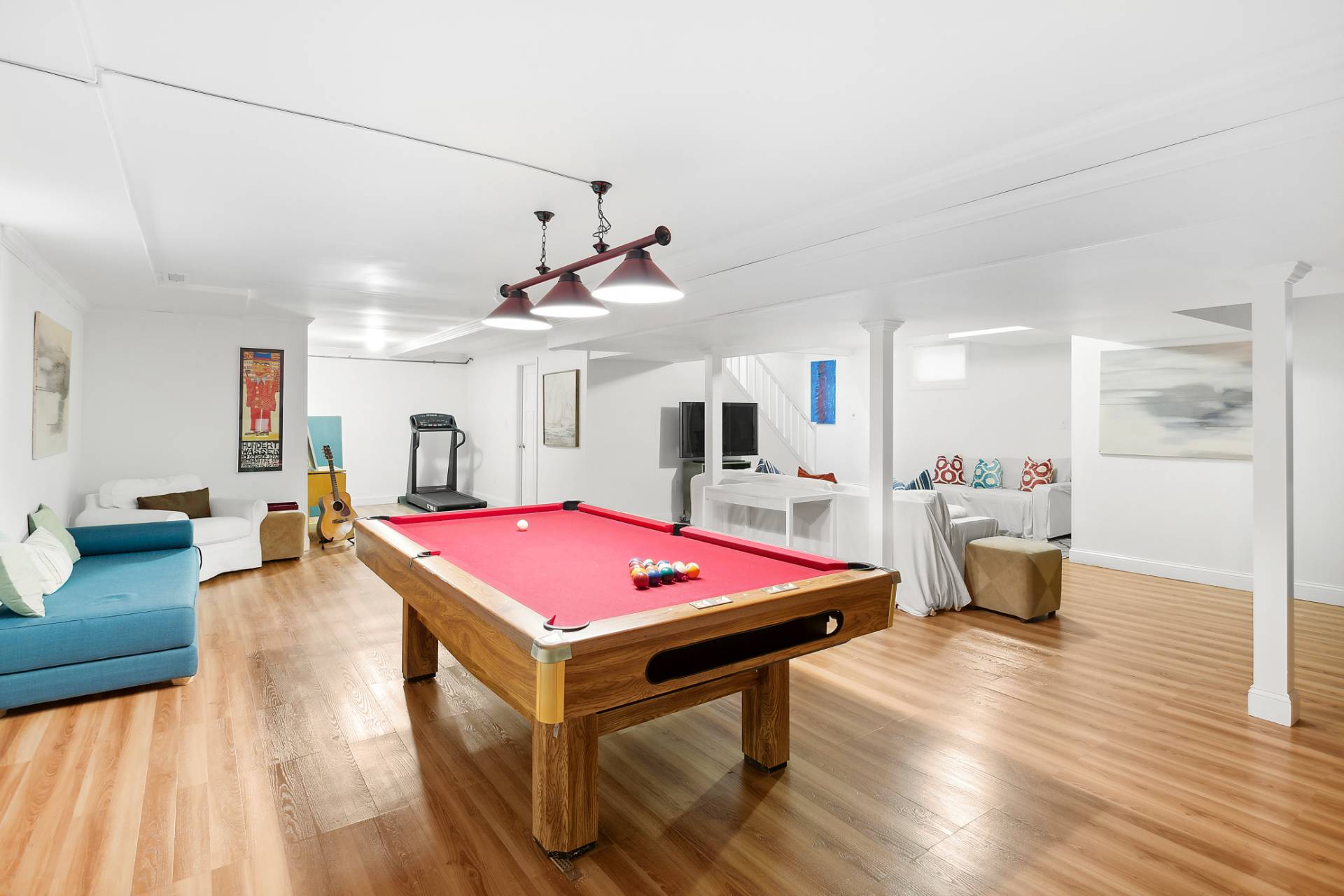15 East Gate Road Wainscott, NY 11975 - Photo 9 of 9 a living room with furniture and flat screen tv