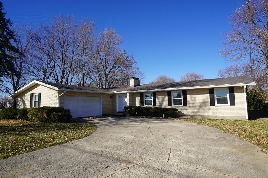 8746 Grubbs-Rex Road Arcanum, OH 45304 - Photo 1 of 38 This charming residence offers a spacious driveway and a welcoming front exterior.