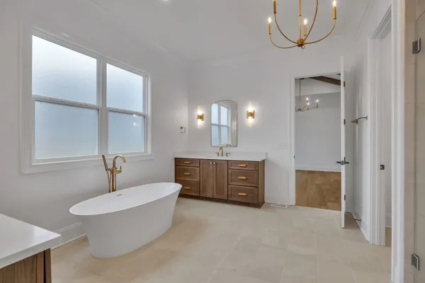 a front view of a house with swimming pool and glass windows