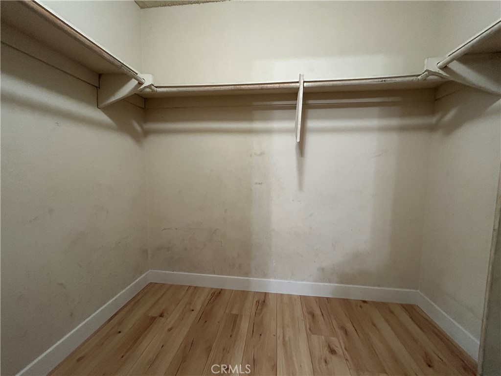 511 D Street Upland, CA 91786 - Photo 15 of 23 a view of walk in closet with empty racks