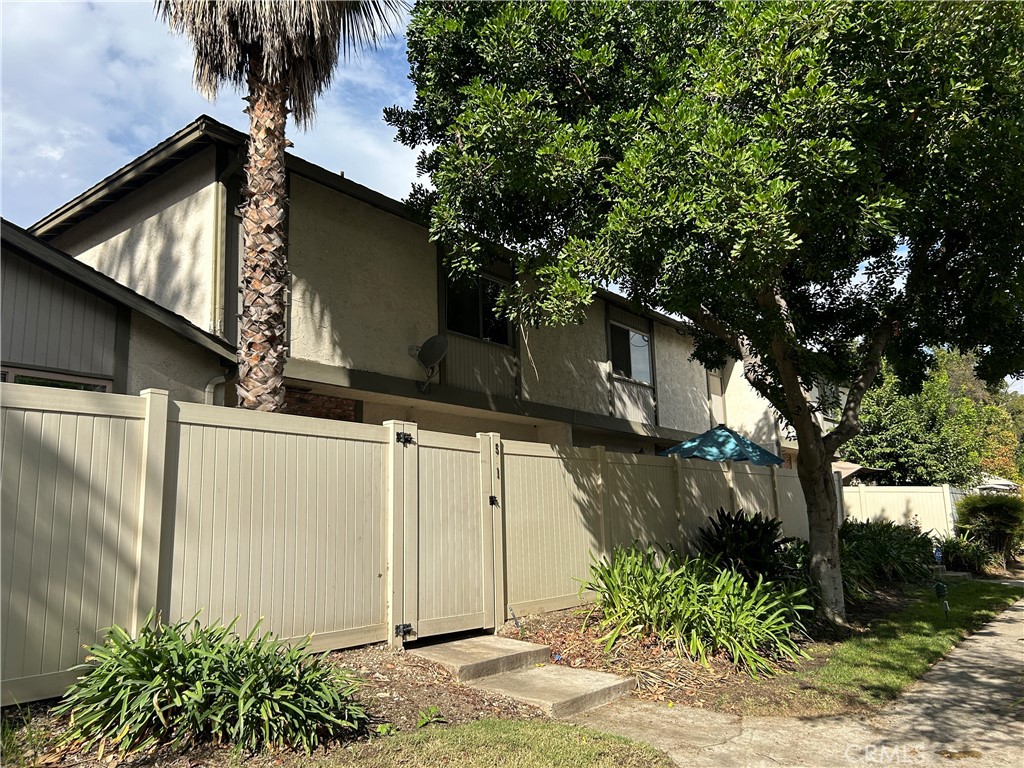 511 D Street Upland, CA 91786 - Photo 21 of 23 a front view of a house with garden