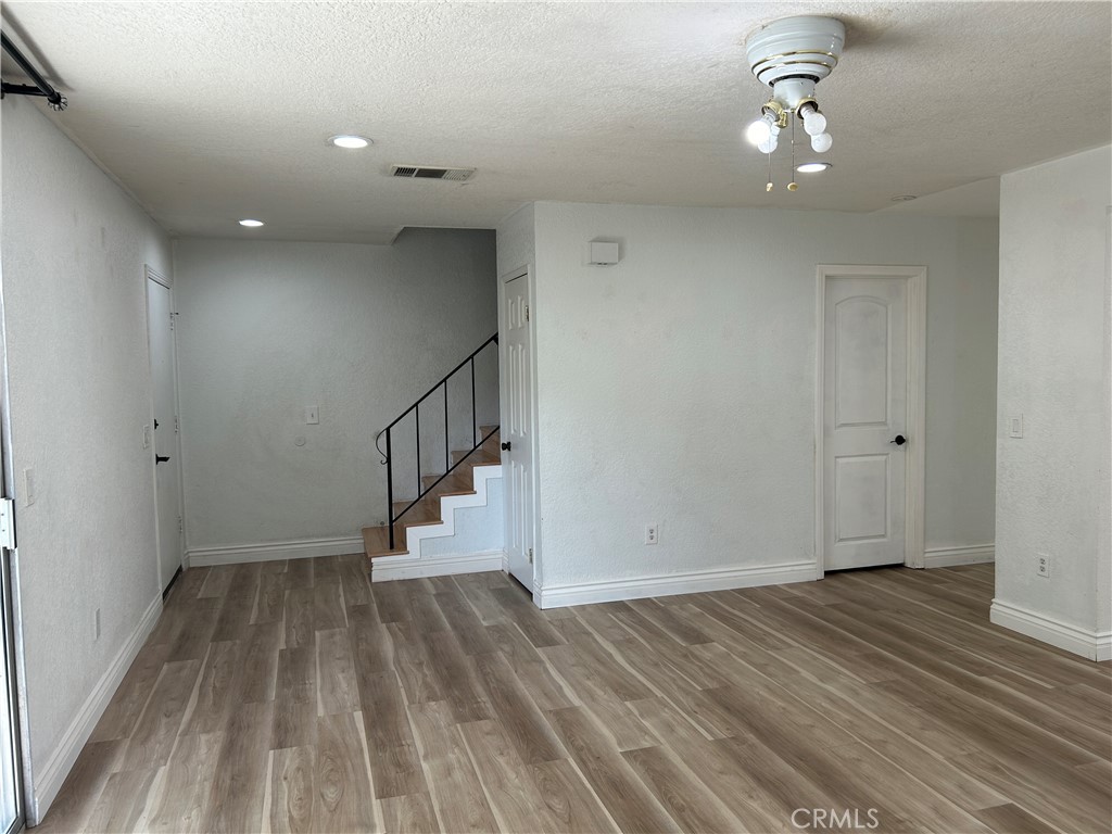 511 D Street Upland, CA 91786 - Photo 5 of 23 a view of entryway with wooden floor
