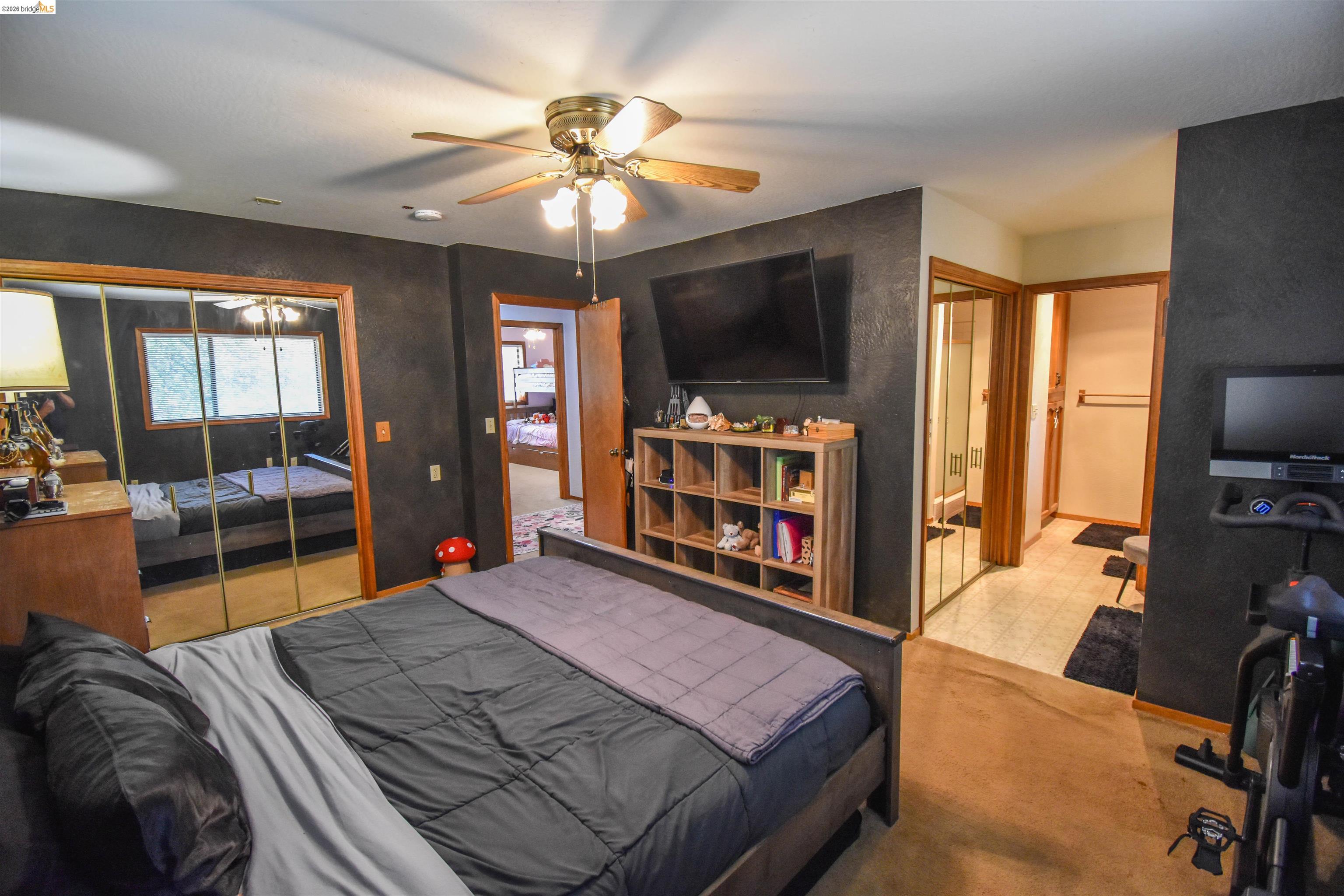 15 Roble Road Sonora, CA 95370 - Photo 28 of 44 Bedroom with a closet, a ceiling fan, and tile patterned floors