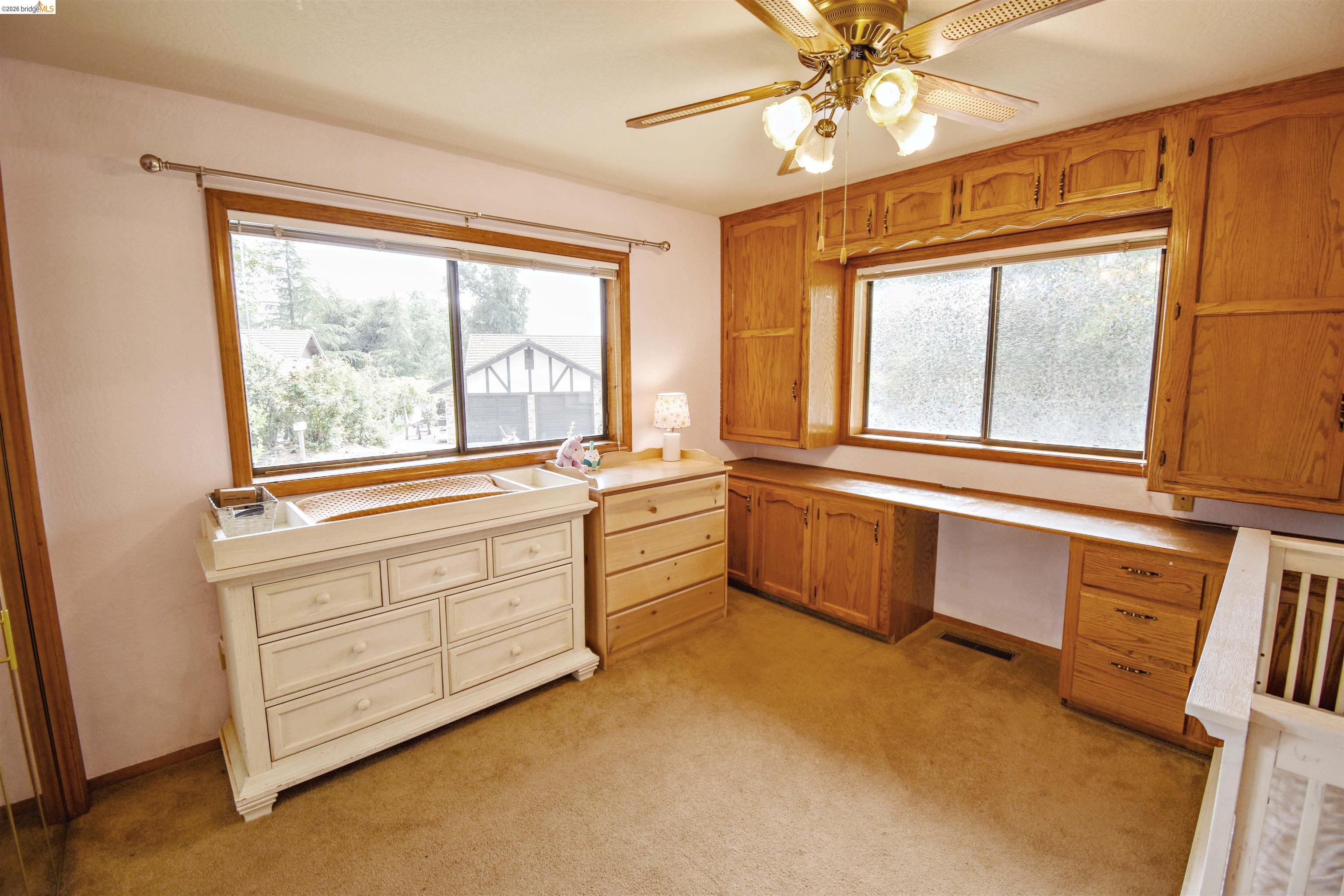 15 Roble Road Sonora, CA 95370 - Photo 33 of 44 Unfurnished office featuring built in study area, a ceiling fan, and light colored carpet
