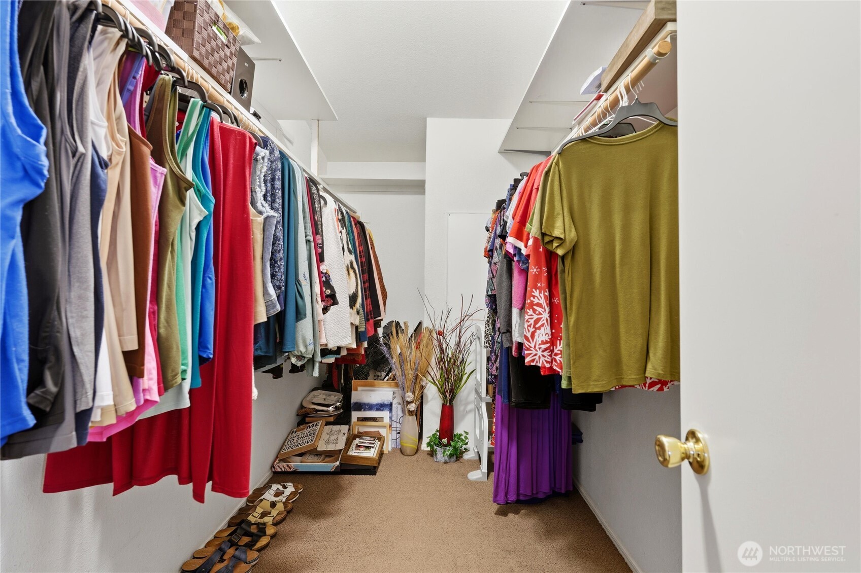 369 Gun Club Road, Unit 88 Woodland, WA 98674 - Photo 11 of 17 a view of walk in closet with clothes