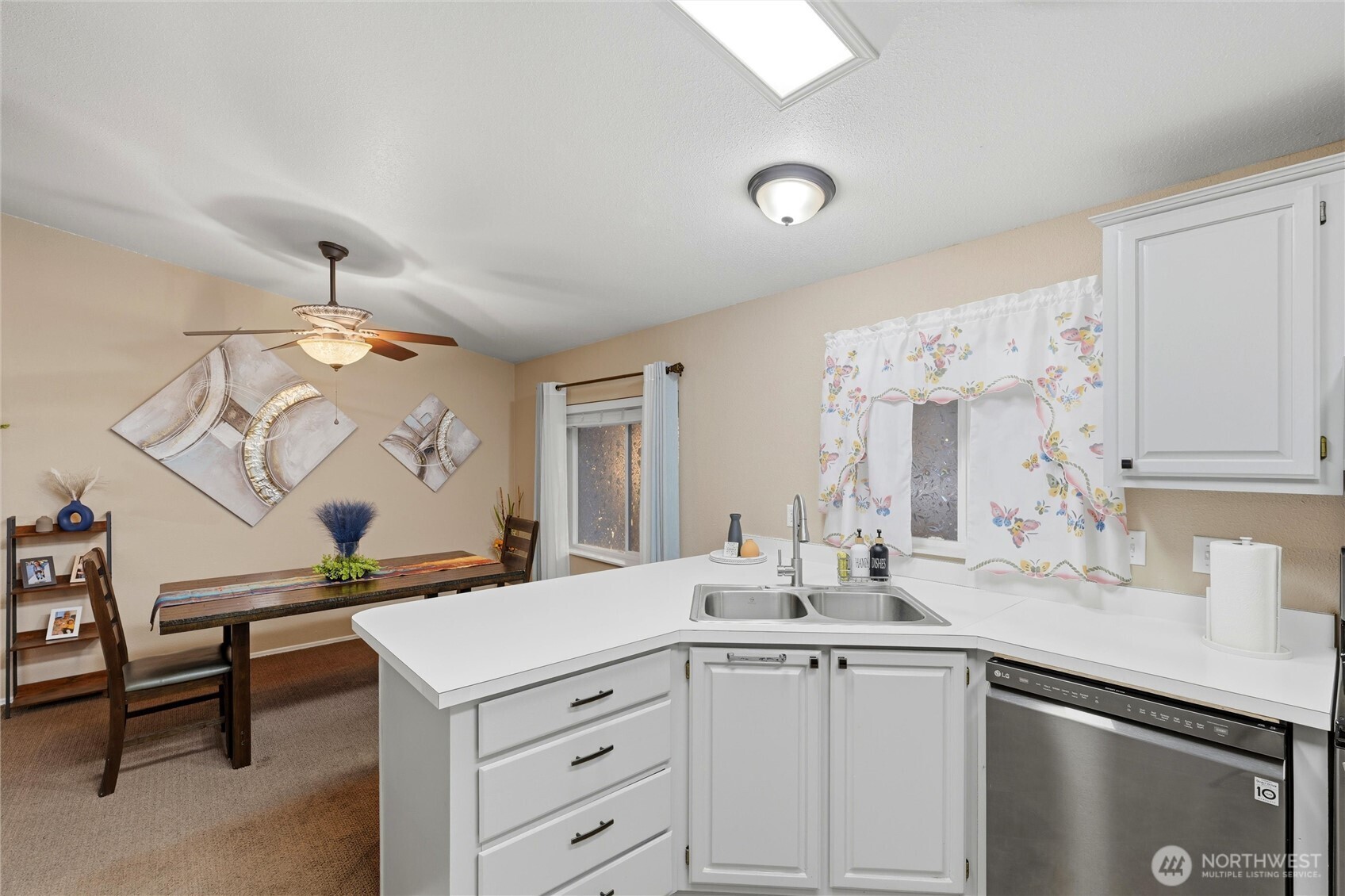 369 Gun Club Road, Unit 88 Woodland, WA 98674 - Photo 7 of 17 a bathroom with a sink and a mirror