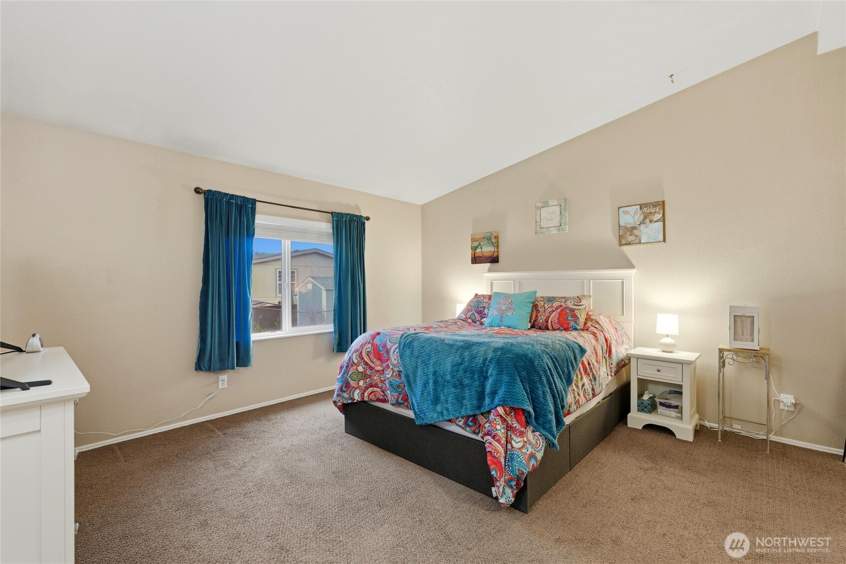 369 Gun Club Road, Unit 88 Woodland, WA 98674 - Photo 10 of 17 a bedroom with a bed and window