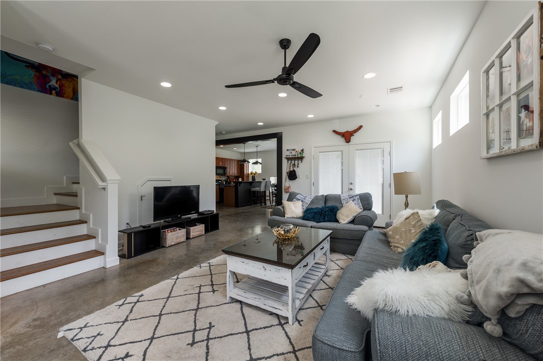 4511 Depew Avenue, Unit A Austin, TX 78751 - Photo 1 of 26 a living room with furniture and a flat screen tv