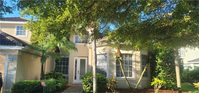 a view of a house with a garden