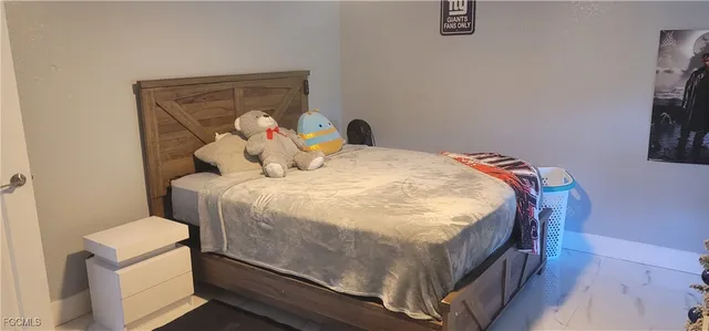 a kitchen with a sink cabinets and appliances