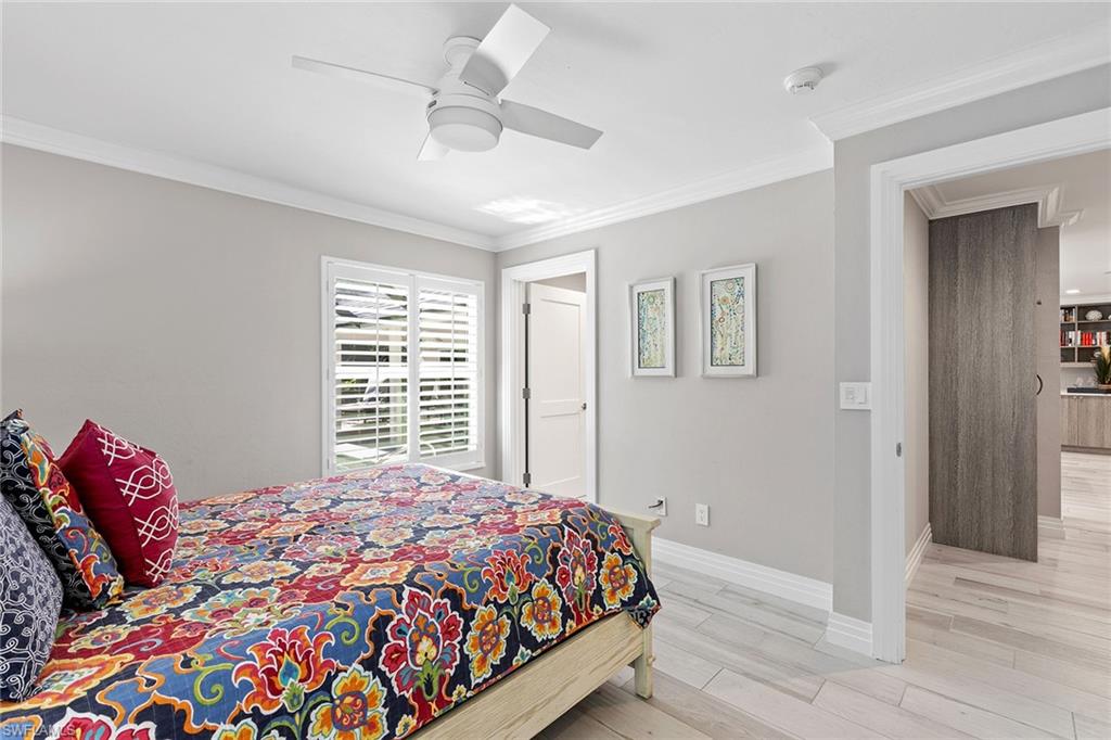 3720 Parkview Way Naples, FL 34103 - Photo 20 of 27 a bedroom with a bed and a window