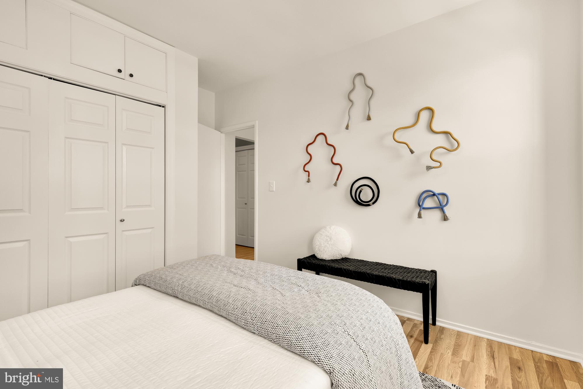 1844 Columbia Road Northwest, Unit 301 Washington, DC 20009 - Photo 12 of 21 a bedroom with a bed and a window