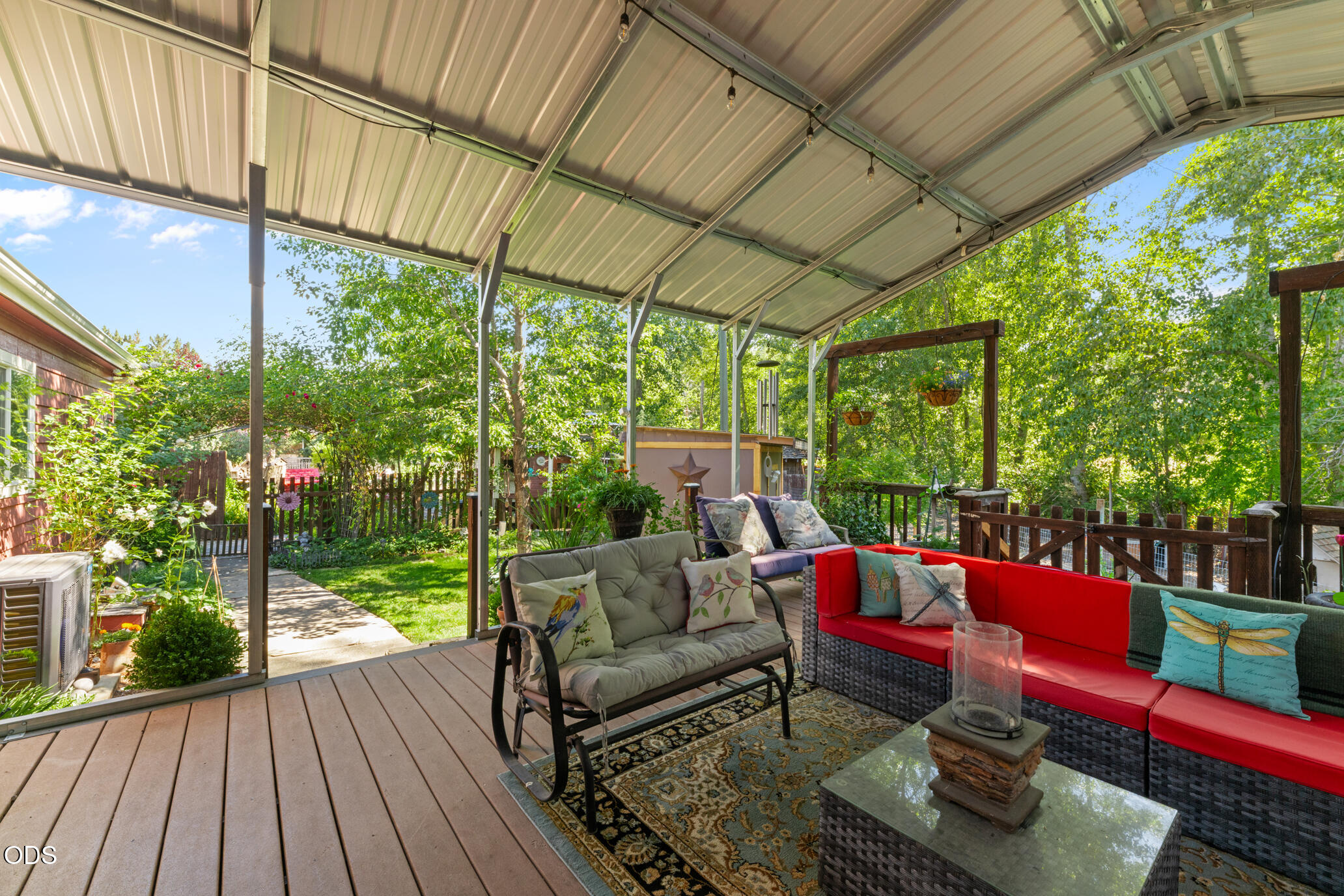 690 Foots Creek Road Gold Hill, OR 97525 - Photo 24 of 45 a balcony with furniture and wooden floor