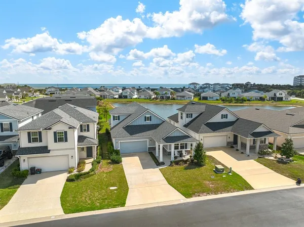 an aerial view of a house with a garden