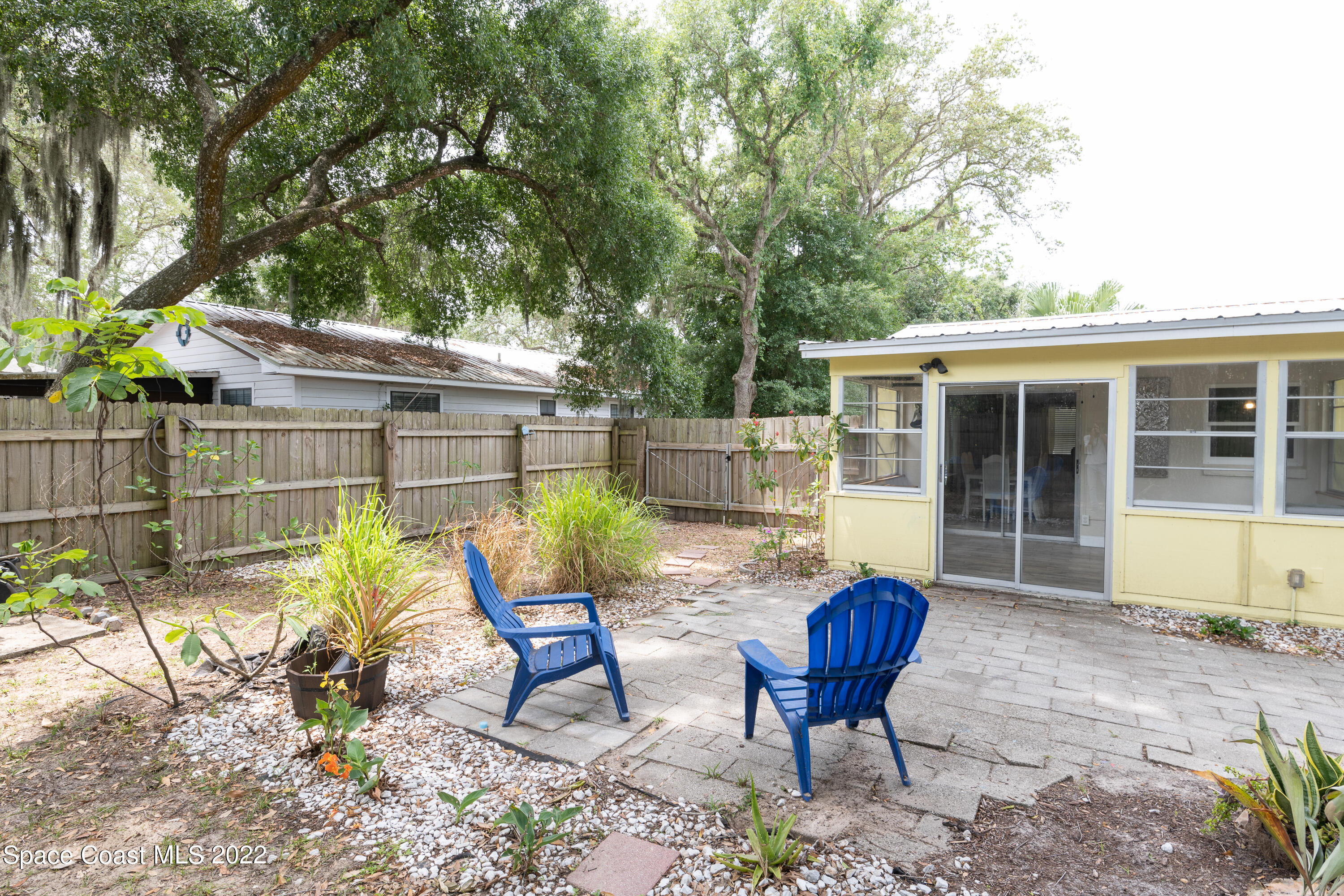 115 Dory Road St. Augustine, FL 32086 - Photo 25 of 31 a view of a chairs in backyard of the house