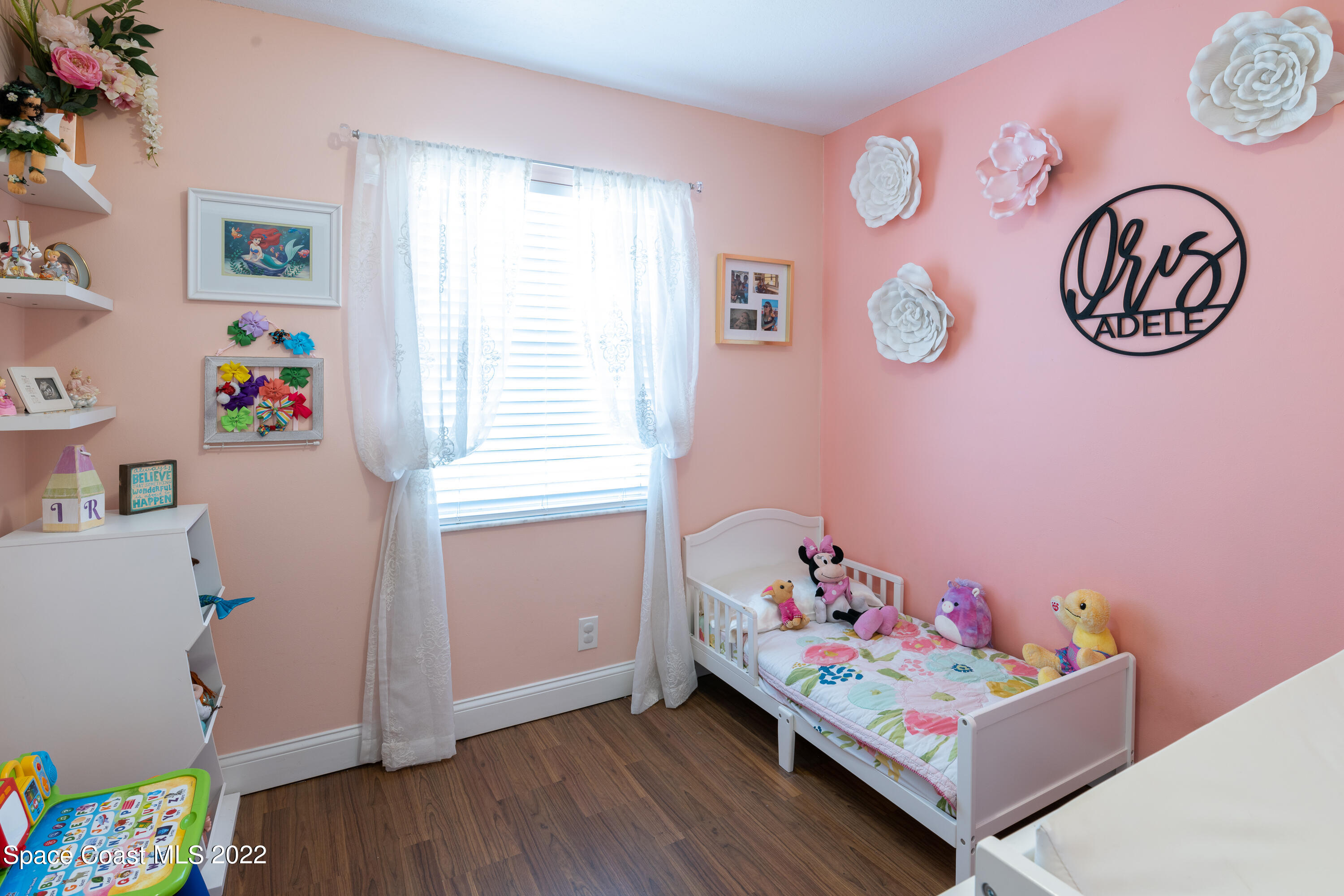 115 Dory Road St. Augustine, FL 32086 - Photo 6 of 31 a bedroom with a bed and a window