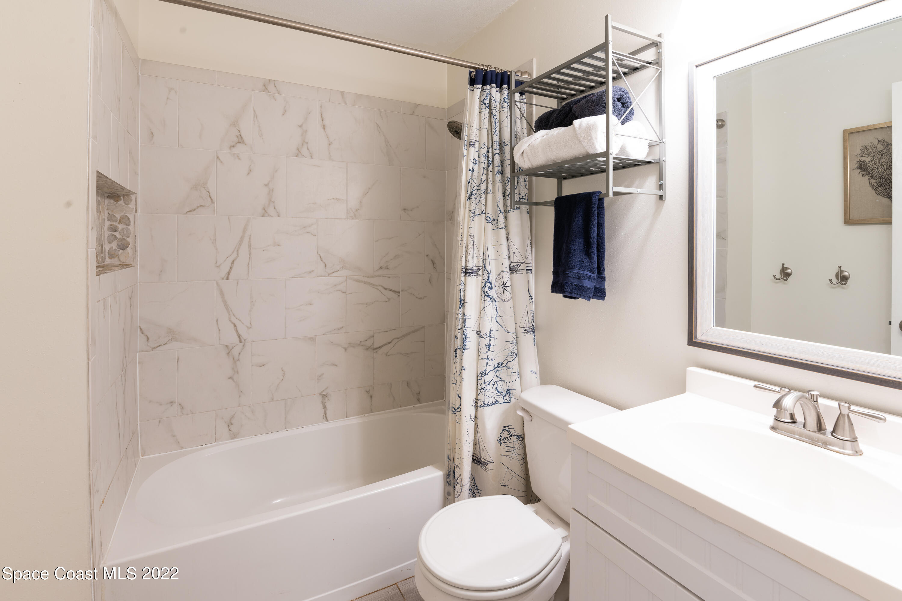 115 Dory Road St. Augustine, FL 32086 - Photo 8 of 31 a bathroom with a sink toilet and shower