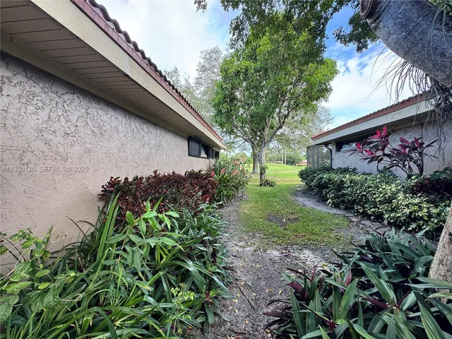a view of a livingroom and entryway