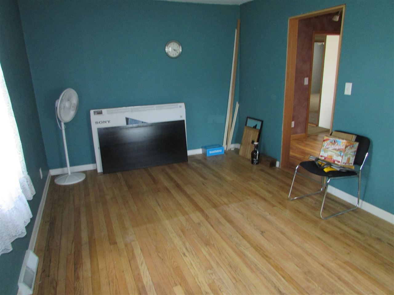 504 Barry Road Rockford, IL 61109 - Photo 21 of 31 a bedroom with a bed and a mirror