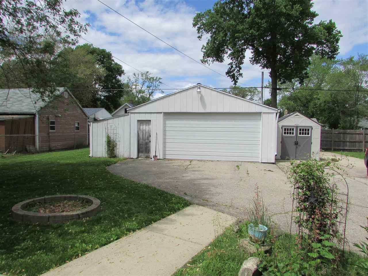 504 Barry Road Rockford, IL 61109 - Photo 25 of 31 a front view of a house with garden