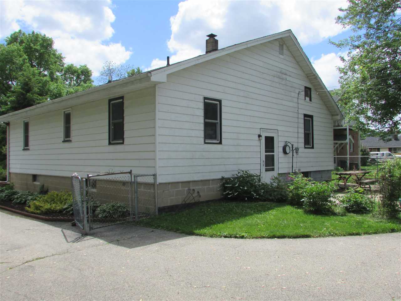 504 Barry Road Rockford, IL 61109 - Photo 30 of 31 a view of a house with a yard