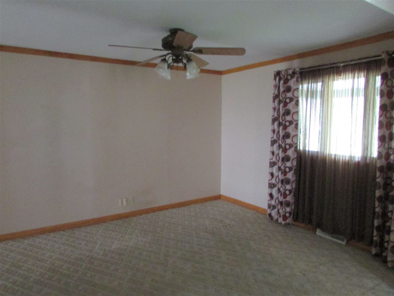 504 Barry Road Rockford, IL 61109 - Photo 5 of 31 a view of an empty room and window