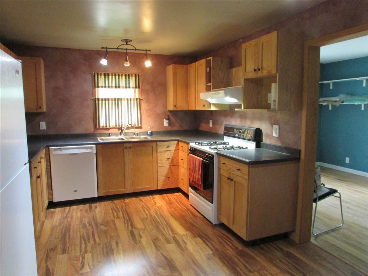 504 Barry Road Rockford, IL 61109 - Photo 10 of 31 a kitchen with a sink stove and cabinets