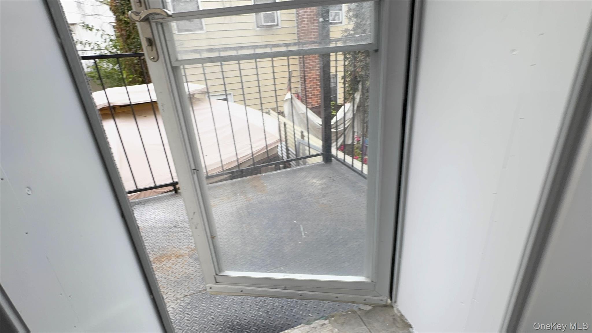 25-38 22nd Street, Unit 1 Queens, NY 11102 - Photo 15 of 19 a view of a glass door