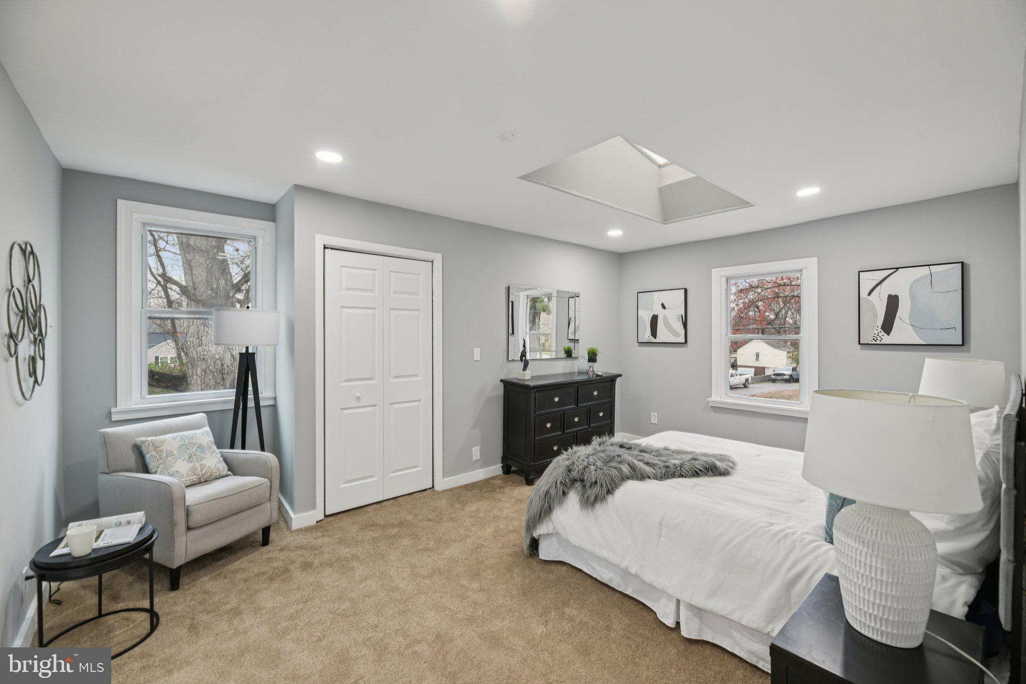 14610 Brandywine Heights Road Brandywine, MD 20613 - Photo 11 of 25 a spacious bedroom with a bed and furniture