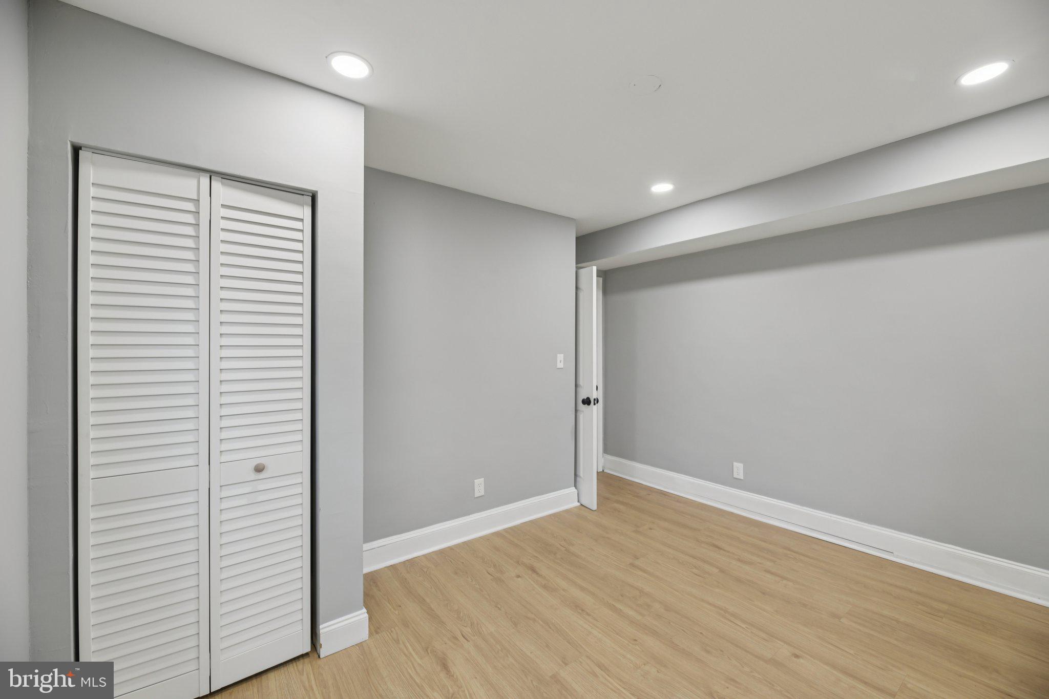 14610 Brandywine Heights Road Brandywine, MD 20613 - Photo 15 of 25 a view of an empty room with wooden floor