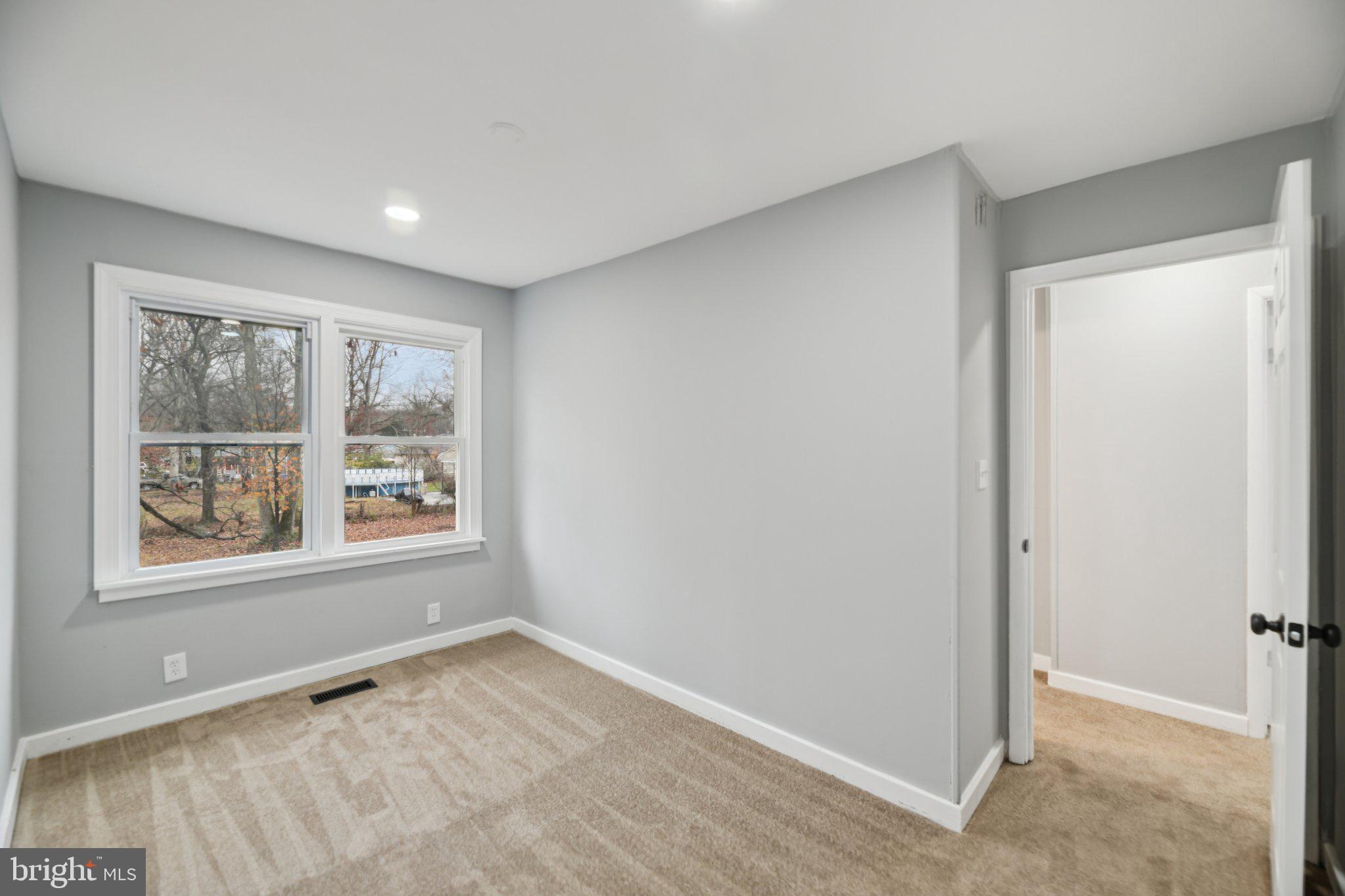 14610 Brandywine Heights Road Brandywine, MD 20613 - Photo 16 of 25 a view of an empty room with a window