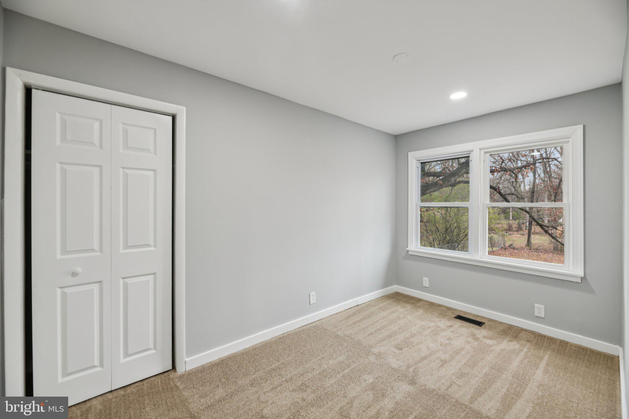 14610 Brandywine Heights Road Brandywine, MD 20613 - Photo 17 of 25 an empty room with windows