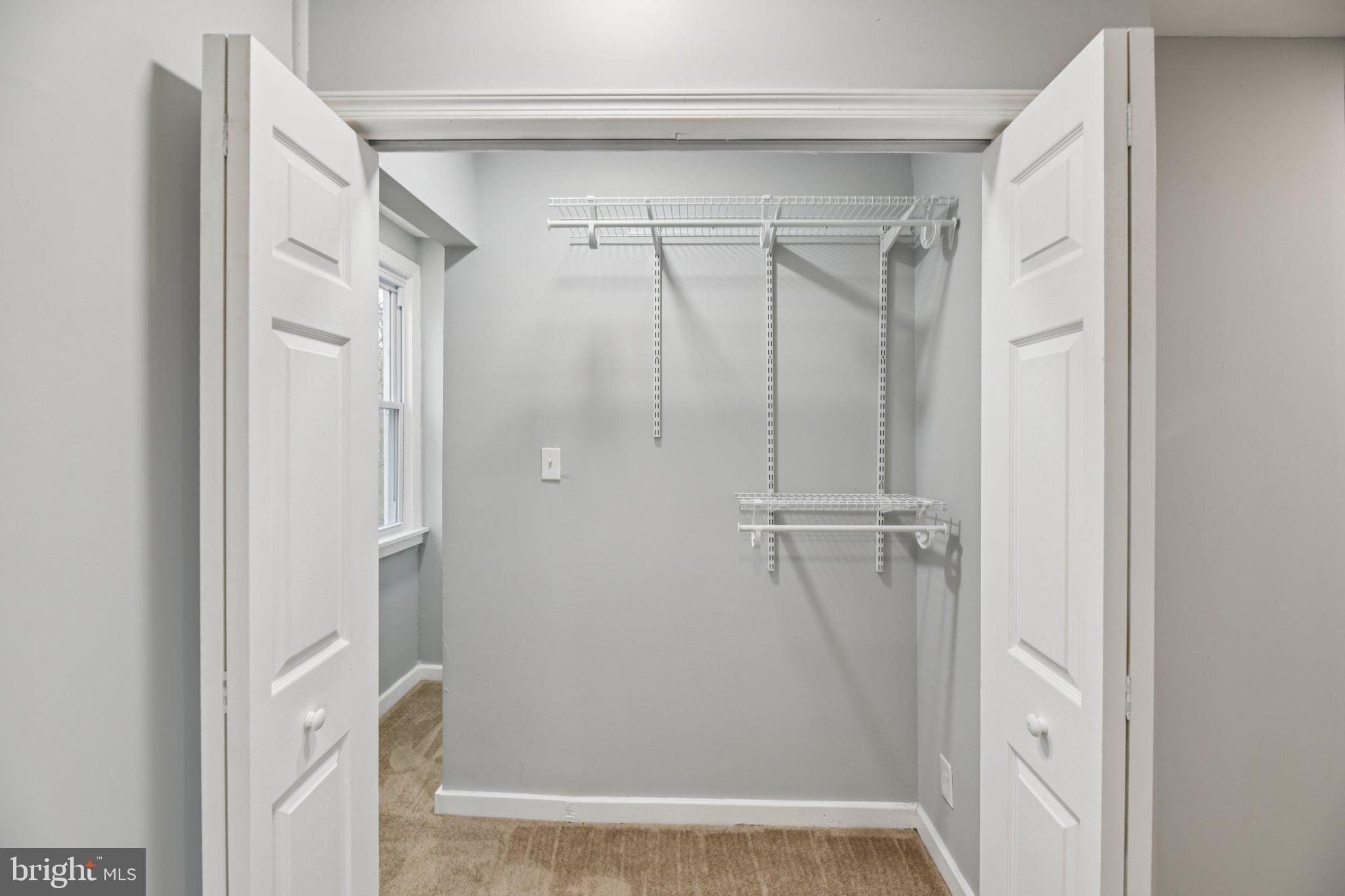 14610 Brandywine Heights Road Brandywine, MD 20613 - Photo 20 of 25 a bathroom with a glass shower door