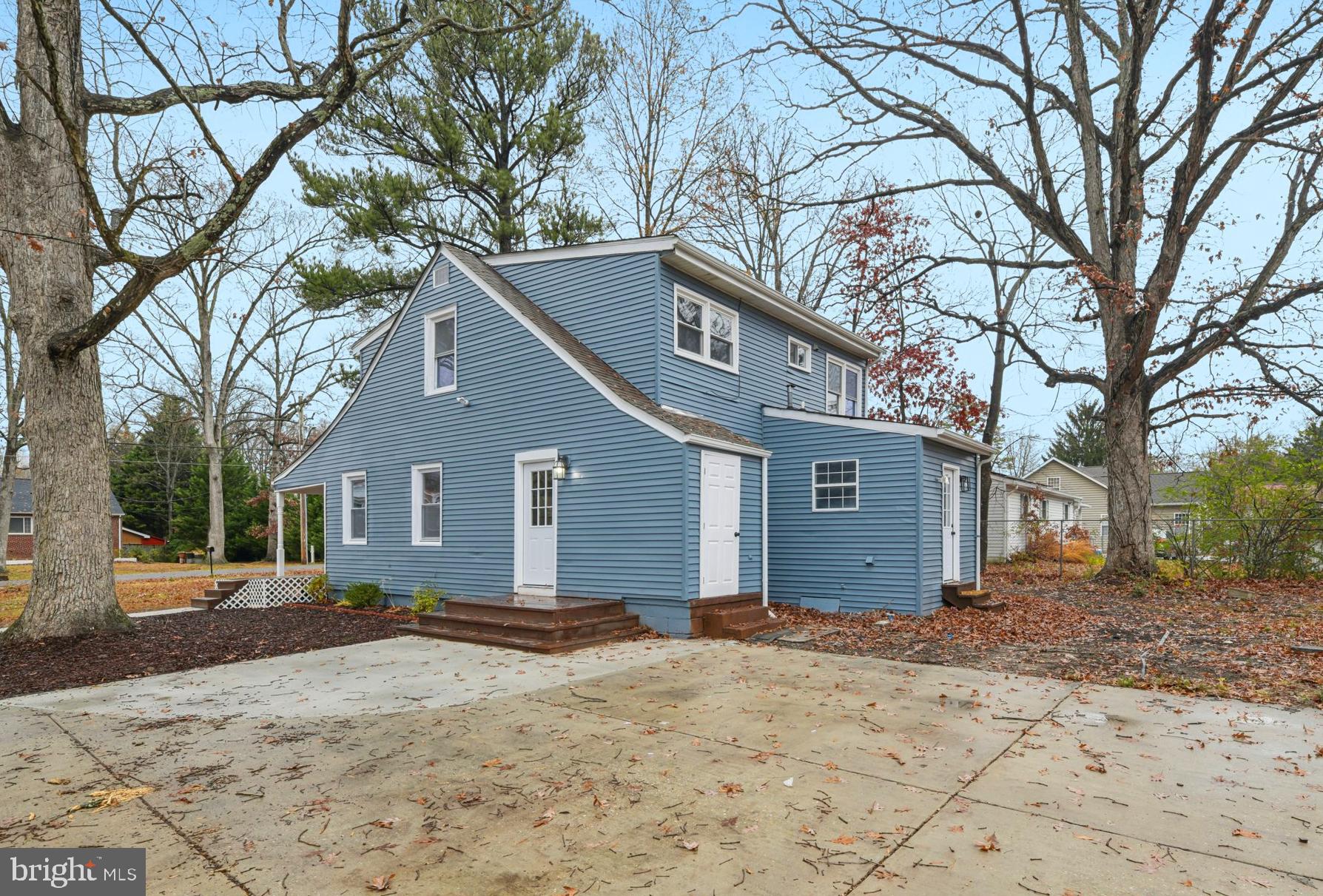 14610 Brandywine Heights Road Brandywine, MD 20613 - Photo 21 of 25 a front view of a house with a yard covered in snow