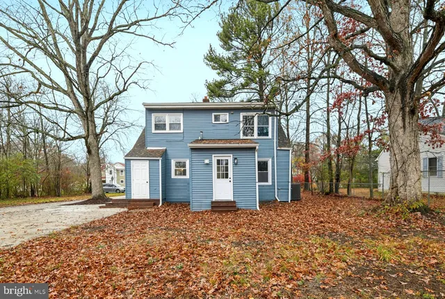 front view of a house with a trees